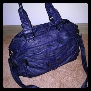 Navey leather bag  with lots and lots of bockets